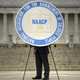 A sign with the logo of the NAACP is seen during a rally at the Lincoln Memorial on the National Mall in Washington, D.C., on June 15, 2015, for an event focused on voting rights and civil rights.
BRENDAN SMIALOWSKI/AFP/Getty Images
